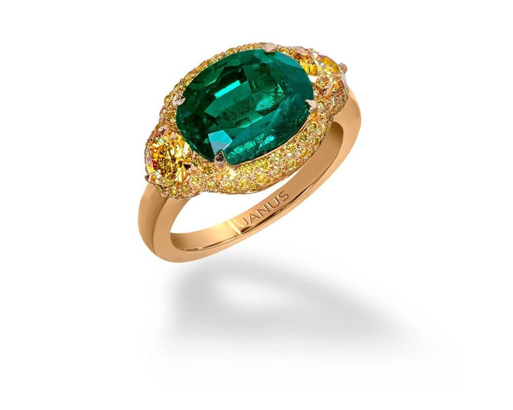 Jewelry creations 3.719 carat, old mine Colombian emerald ring, accented by two brilliant cut, fancy vivid yellow diamonds