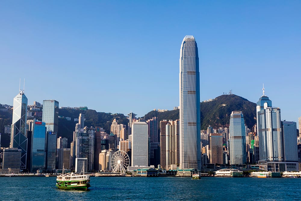 Art dealer in london Hong Kong city skyline
